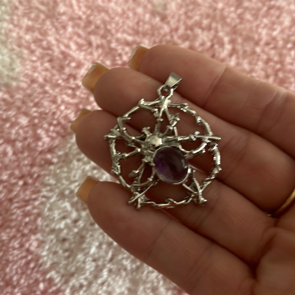Stainless steal necklaces with a lavender spider pendant